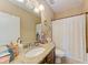 Clean bathroom with granite countertop and shower at 12031 Longview Lake Cir, Bradenton, FL 34211