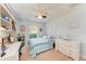 Bedroom with a ceiling fan and built-in shelving at 12031 Longview Lake Cir, Bradenton, FL 34211