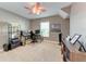 Bright home office features built-in shelving and window views at 12031 Longview Lake Cir, Bradenton, FL 34211
