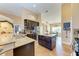 Spacious kitchen with granite countertops, dark wood cabinets and an island at 12031 Longview Lake Cir, Bradenton, FL 34211