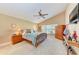 Main bedroom with water view, high ceilings, and large windows at 12031 Longview Lake Cir, Bradenton, FL 34211