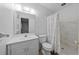 Bathroom with shower/tub combo and updated vanity at 1215 E Venice Ave, Venice, FL 34285