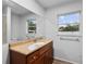 Bathroom with granite countertop and updated vanity at 1215 E Venice Ave, Venice, FL 34285