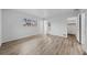 Spacious bedroom with walk-in closet and wood-look floors at 1215 E Venice Ave, Venice, FL 34285