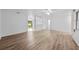 Bright living area with wood-look floors and open layout at 1215 E Venice Ave, Venice, FL 34285