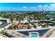 Aerial view shows community near the water, with lush tropical landscape at 129 Tyler Dr # 101, Sarasota, FL 34236