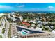 Aerial view of community, pool, and beach access at 129 Tyler Dr # 101, Sarasota, FL 34236