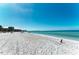 Lido beach with white sand and calm water at 129 Tyler Dr # 101, Sarasota, FL 34236