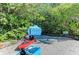 Two kayaks sit at the mangrove-lined kayak launch at 129 Tyler Dr # 101, Sarasota, FL 34236