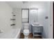 Updated bathroom with a modern vanity and shower/tub combo at 129 Woodland Pl, Osprey, FL 34229