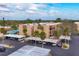 Aerial view of condo building with parking and pool at 1330 Glen Oaks E Dr # 268D, Sarasota, FL 34232