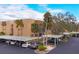 Aerial view showing condo building and parking at 1330 Glen Oaks E Dr # 268D, Sarasota, FL 34232