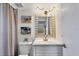 Clean bathroom with updated vanity and a framed mirror at 1330 Glen Oaks E Dr # 268D, Sarasota, FL 34232