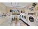 Convenient community laundry room with multiple washers and dryers at 1330 Glen Oaks E Dr # 268D, Sarasota, FL 34232