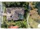 Bird's-eye view of home with pool and landscaping at 13605 Legends Walk Ter, Lakewood Ranch, FL 34202