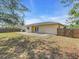 Spacious backyard with a patio, perfect for outdoor relaxation and entertaining at 1382 Ronald St, North Port, FL 34286