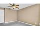 Bedroom featuring carpeted floors, neutral paint, and a ceiling fan at 1382 Ronald St, North Port, FL 34286