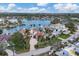 Wide aerial view of waterfront home and neighborhood at 1389 Tangier Way, Sarasota, FL 34239