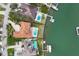 Bird's-eye view of waterfront home and neighborhood at 1389 Tangier Way, Sarasota, FL 34239