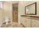 Clean bathroom with a shower and granite countertop at 1389 Tangier Way, Sarasota, FL 34239
