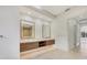 Double vanity bathroom with modern design and a view at 1389 Tangier Way, Sarasota, FL 34239