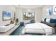 Main bedroom with water views and stylish decor at 1389 Tangier Way, Sarasota, FL 34239