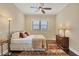 Bright bedroom with hardwood floors, a ceiling fan and a cozy rug at 1389 Tangier Way, Sarasota, FL 34239