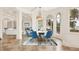 Bright dining room with water views and seating for six at 1389 Tangier Way, Sarasota, FL 34239