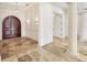Spacious entryway with high ceilings and elegant tile flooring at 1389 Tangier Way, Sarasota, FL 34239