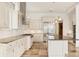 Updated kitchen with stainless steel appliances and granite countertops at 1389 Tangier Way, Sarasota, FL 34239