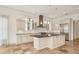 Large kitchen with an island, stainless steel appliances, and granite countertops at 1389 Tangier Way, Sarasota, FL 34239