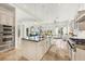 Gourmet kitchen with island, stainless steel appliances, and granite counters at 1389 Tangier Way, Sarasota, FL 34239