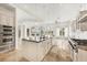 Modern kitchen featuring an island, stainless steel appliances, and ample cabinet space at 1389 Tangier Way, Sarasota, FL 34239