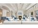 Elegant living room with a coffered ceiling and comfortable seating at 1389 Tangier Way, Sarasota, FL 34239