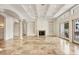 Spacious living room with high ceilings and fireplace at 1389 Tangier Way, Sarasota, FL 34239