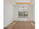 Bright office space with an arched window and built in shelving at 1389 Tangier Way, Sarasota, FL 34239