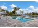 Luxury pool and spa area with canal views at 1389 Tangier Way, Sarasota, FL 34239