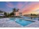 Spacious pool and spa with stunning sunset and water views at 1389 Tangier Way, Sarasota, FL 34239