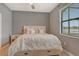 Serene bedroom with a comfortable bed and plenty of light at 15910 Clear Skies Pl, Bradenton, FL 34211
