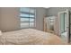 Comfortable bedroom with a queen-size bed and dresser at 15910 Clear Skies Pl, Bradenton, FL 34211