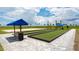 Outdoor bocce ball courts with seating at 15910 Clear Skies Pl, Bradenton, FL 34211