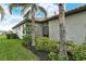 Side view showcasing the home's exterior and landscaping at 15910 Clear Skies Pl, Bradenton, FL 34211