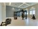 Functional fitness area with TRX straps, weights, and a tire at 15910 Clear Skies Pl, Bradenton, FL 34211