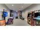 Community game room with arcade games and other entertainment at 15910 Clear Skies Pl, Bradenton, FL 34211