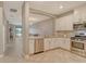 Modern kitchen with stainless steel appliances and granite countertops at 15910 Clear Skies Pl, Bradenton, FL 34211