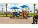 Colorful playground with slides and climbing structures at 15910 Clear Skies Pl, Bradenton, FL 34211