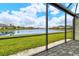 Enjoy tranquil lake views from this screened patio at 15910 Clear Skies Pl, Bradenton, FL 34211