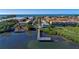 Aerial view showing community, pool, and private dock access at 1603 Gulf N Dr # 27, Bradenton Beach, FL 34217