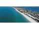 Aerial view of beachfront property with ocean and community at 1603 Gulf N Dr # 27, Bradenton Beach, FL 34217