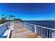 Private community dock with seating, overlooking the bay at 1603 Gulf N Dr # 27, Bradenton Beach, FL 34217